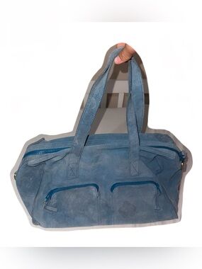 Cute Blue Suede Bag with a Red Bow